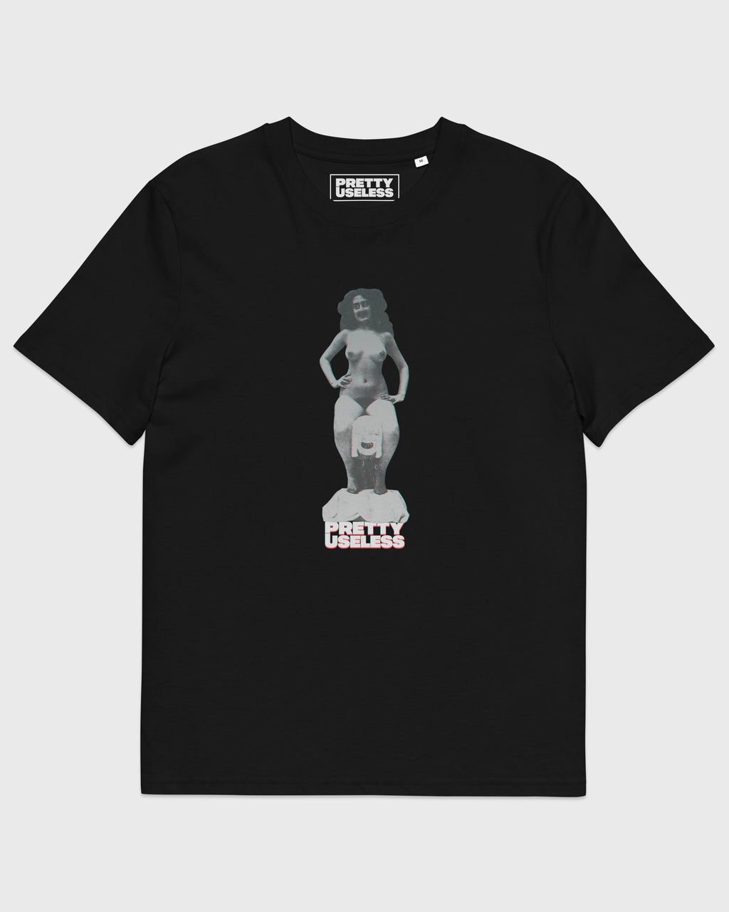 Frontansicht eines schwarzen PRETTY USELESS T-Shirts mit surrealem Frauenmotiv auf der Brust.