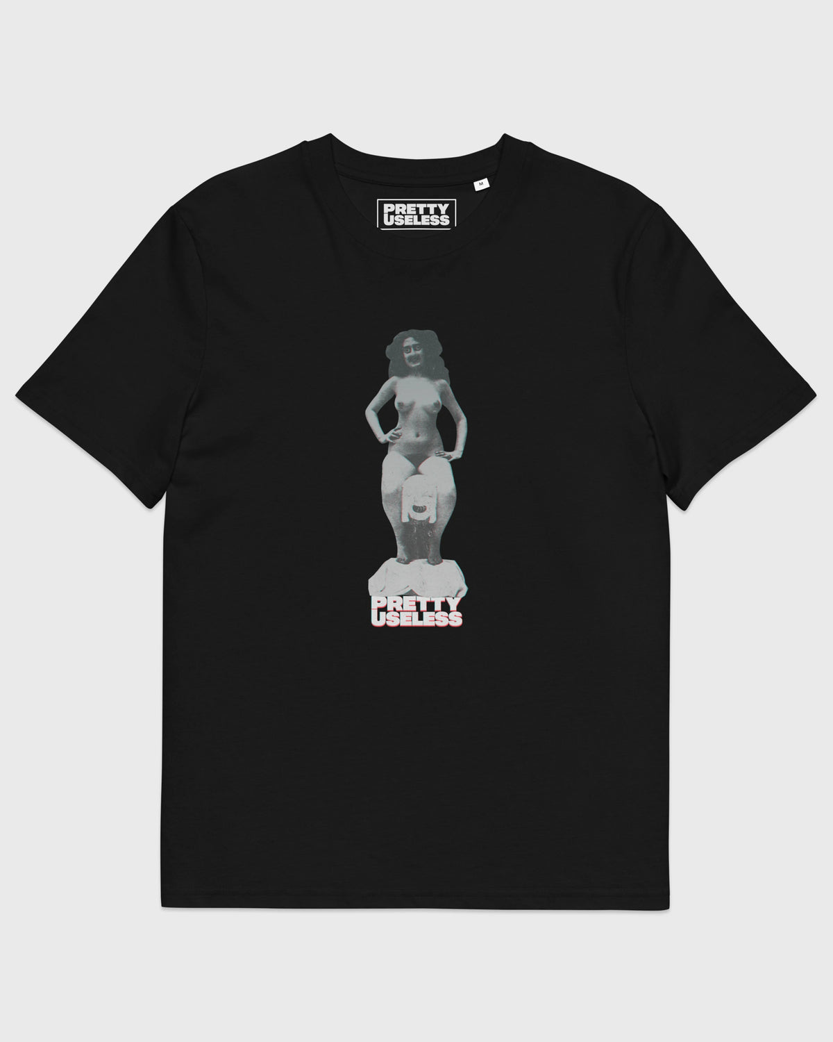Frontansicht eines schwarzen PRETTY USELESS T-Shirts mit surrealem Frauenmotiv auf der Brust.